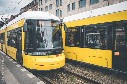 Berlin city tram, electric train on the street at Warschauerstr. in Berlin