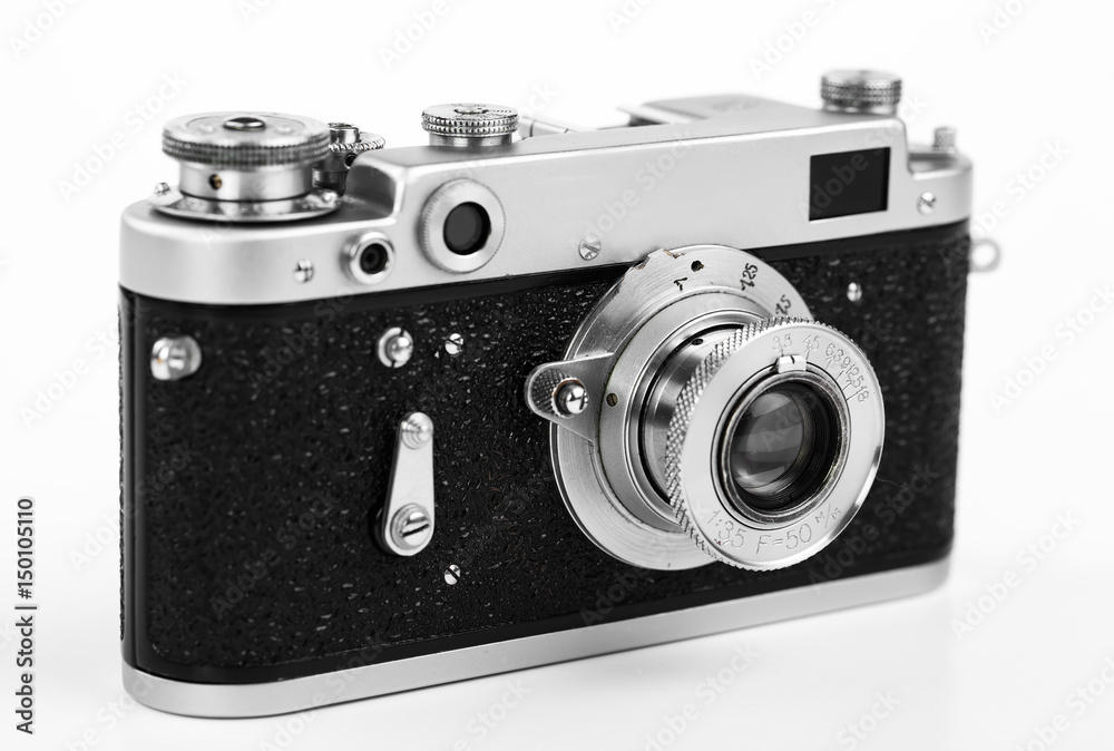 Old camera on white background on desk Old camera on white background on desk