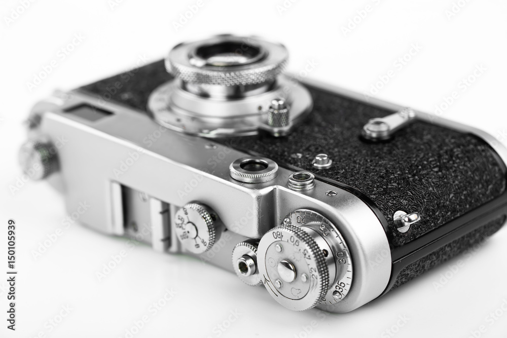 Old camera on white background on desk Old camera on white background on desk