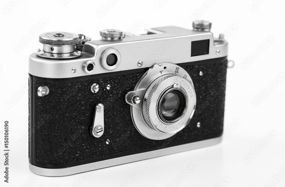 Old camera on a tripod on a white background Old camera on a tripod on a white background