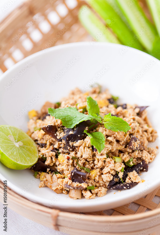 Ground pork salad with fresh vegetable and lemon, Traditional Thai food, selective focus