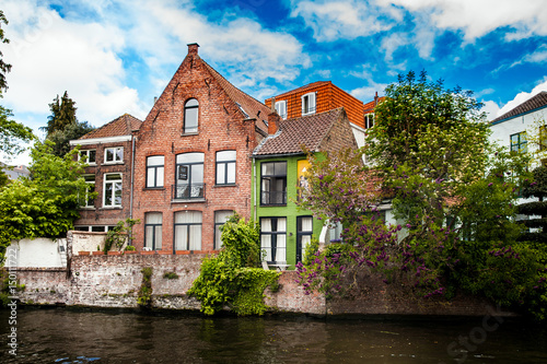 Architecture of Bruges city, traditional houses view on the canal