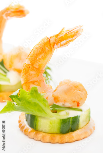 Prawn appetizer. Shrimp with Wasabi Mayonnaise on cucumber bite
