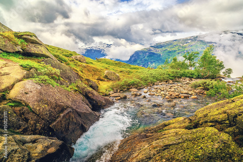 Fototapeta Naklejka Na Ścianę i Meble -  National park Hardangervidda, Norway. Breathtaking scenery on hiking trail from Odda to Mosdalsvatnet and Trolltunga with Norwegian typical nature landscape of northern nature.