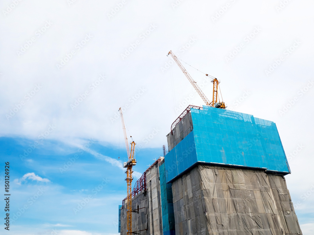 Crane and building construction,
High-rise building under construction