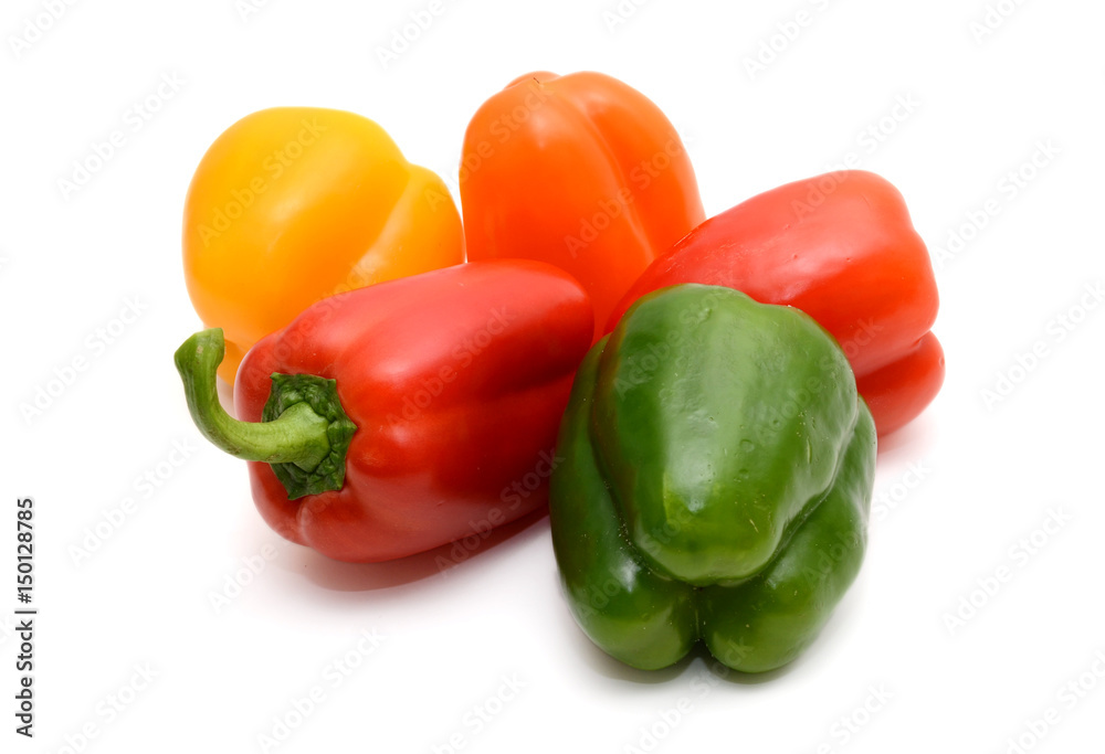 Fresh colorful bell peppers on the white background Fresh colorful bell peppers on the white background
