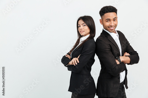 Colleagues business team standing over white background isolated