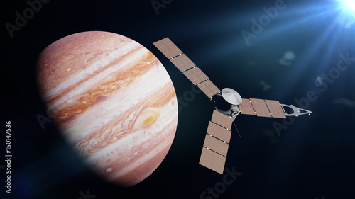 Juno spacecraft in front of the planet Jupiter lit by the Sun photo