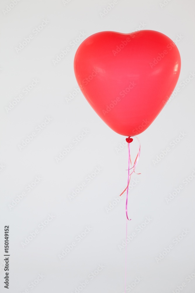 Heart-shaped red balloon Heart-shaped red balloon