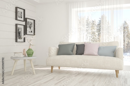 White room with sofa and winter landscape in window. Scandinavian interior design. 3D illustration © AntonSh