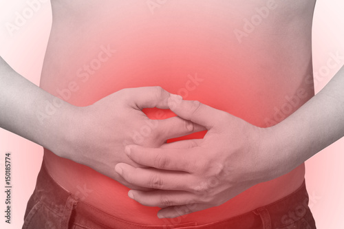 Wallpaper Mural Man suffering from stomachache because he has diarrhea on white Torontodigital.ca