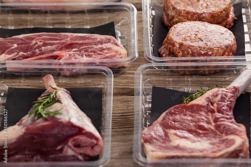 Varieties of meat in plastic boxes