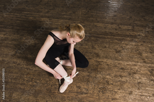 Putting ballet shoes