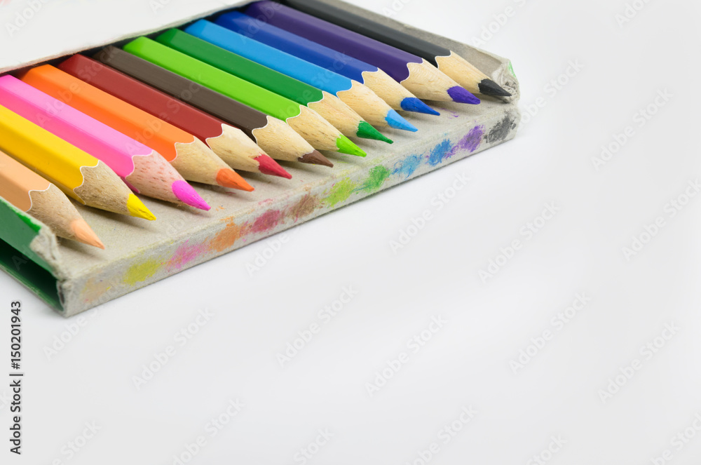 Fototapeta premium The color pencil stacked in the old paper box isolate background with copyspace. Concept Education .