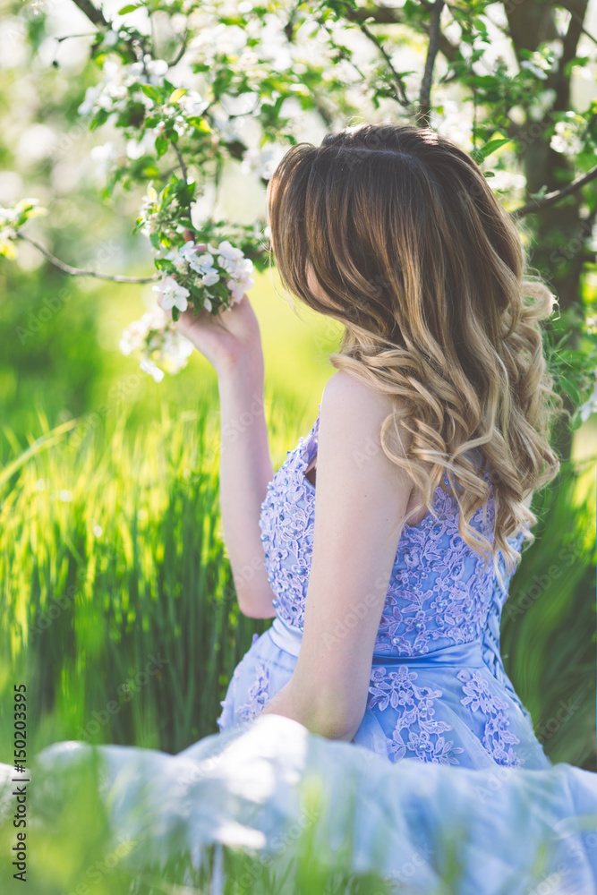 Happy pregnant girl in blossom spring garden Happy pregnant girl in blossom spring garden