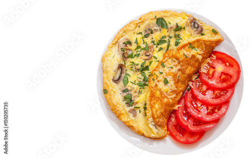 Omelet with mushrooms and cheese. top view. isolated on white photo