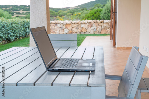 Laptop, tablet on wooden table, ready to work © johnkruger1