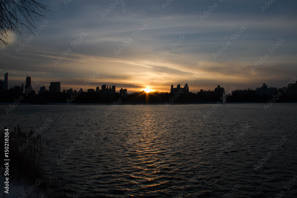 Sunset reflects on the lake in Manhattan