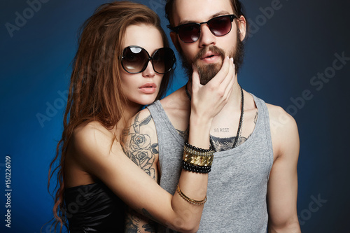 fashion beautiful couple in sunglasses