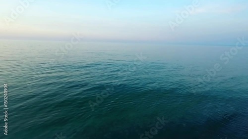 Wallpaper Mural Aerial birds eye view looking down at sea waves crashing down. Green and blue sea top view drone drone footage   Torontodigital.ca