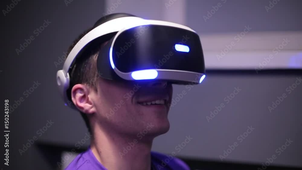Man plays VR video game. Man plays VR video game.