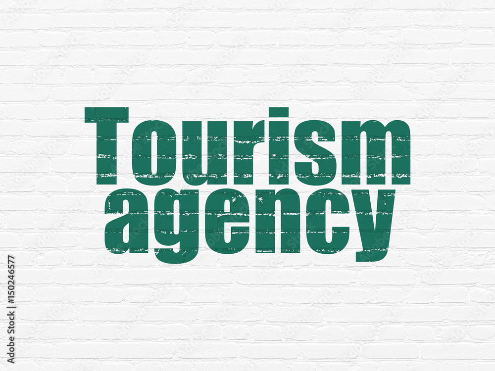 Travel concept: Tourism Agency on wall background Travel concept: Tourism Agency on wall background