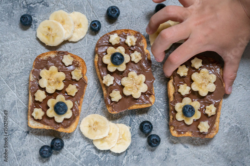 Toast bread with chocolate spread and banana