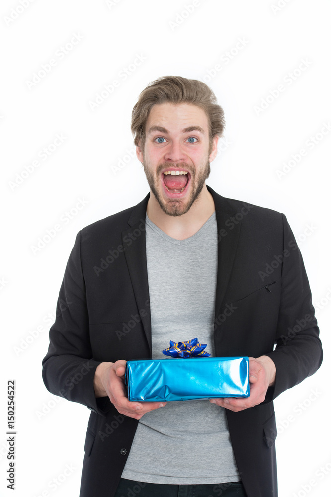 handsome happy businessman holding blue gift box handsome happy businessman holding blue gift box