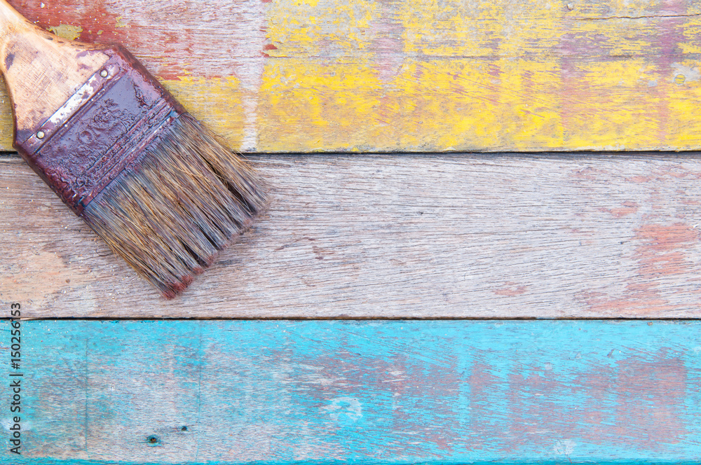 Dirty paint brush on wooden table. Dirty paint brush on wooden table.