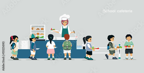 Students stand in line to receive food in the school cafeteria.