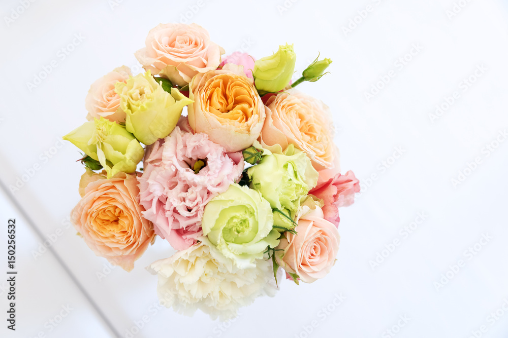 Flower table decorations for holidays and wedding dinner. Table set for holiday, event, party or wedding reception in outdoor restaurant. Flower table decorations for holidays and wedding dinner. Table set for holiday, event, party or wedding reception in outdoor restaurant.