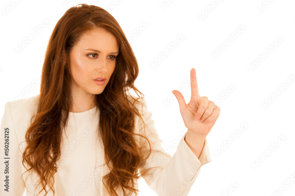 Attractive business woman pressing a virtual button Attractive business woman pressing a virtual button