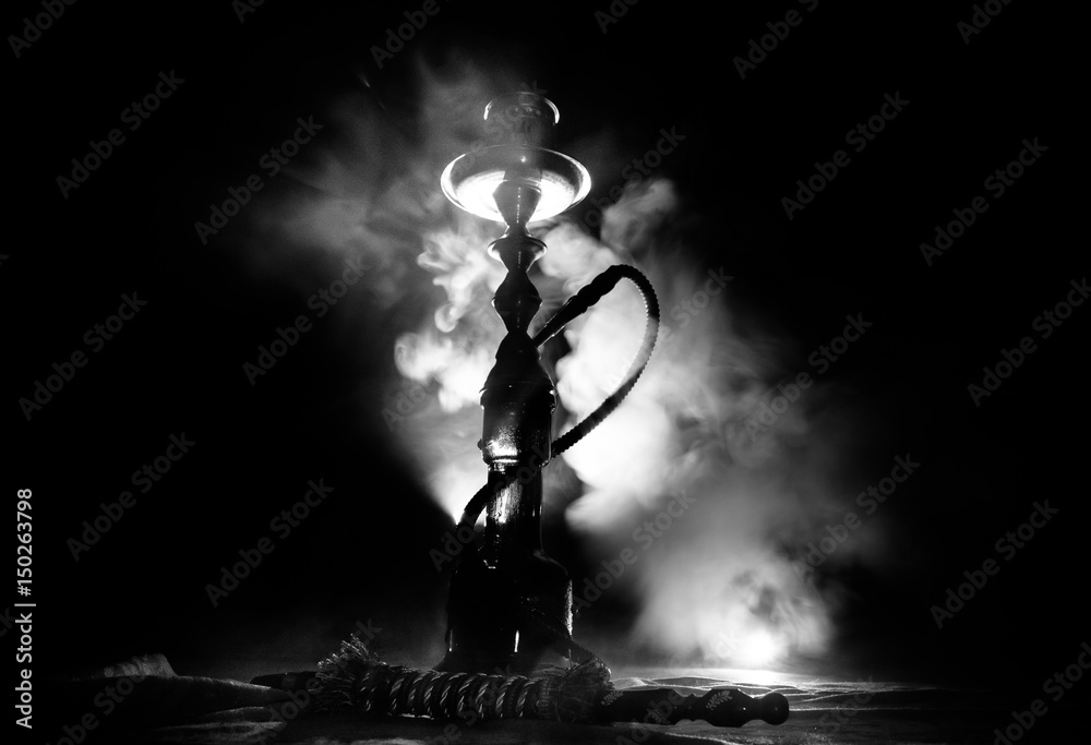 Hookah hot coals on shisha bowl with black background. Stylish oriental