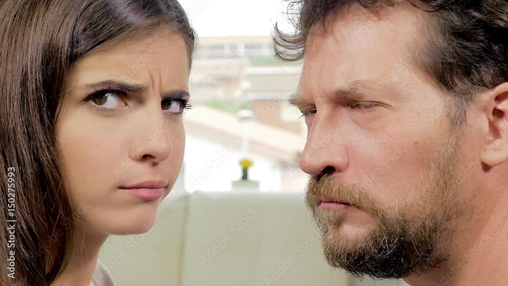 Man and woman making funny weird expressions looking camera Man and woman making funny weird expressions looking camera