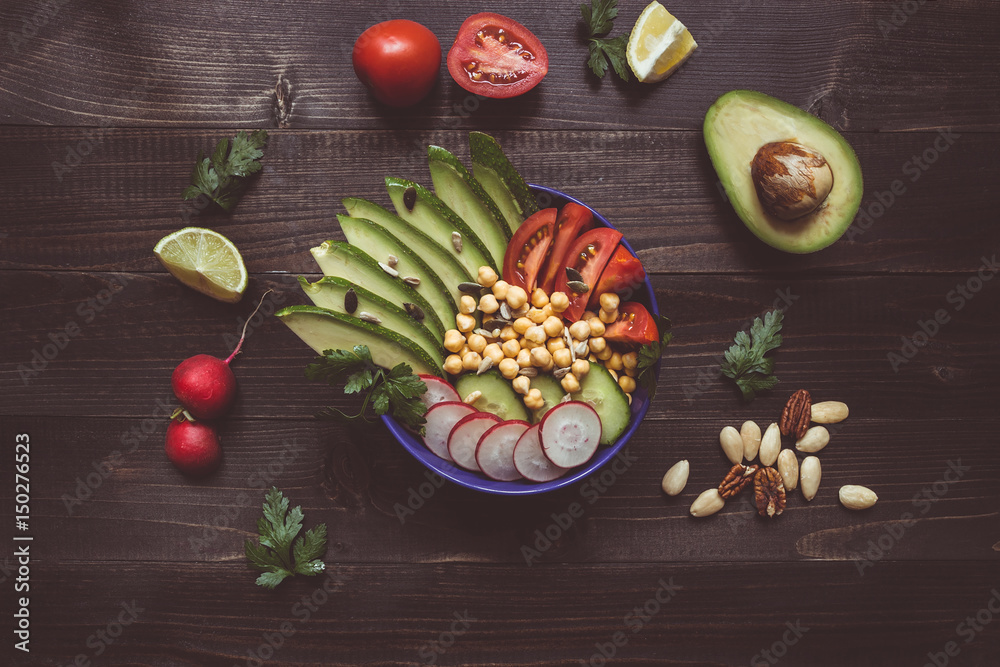 Healthy food concept. Healthy salad with chickpea and vegetables on the wooden table. Vegan food. Vegetarian diet Healthy food concept. Healthy salad with chickpea and vegetables on the wooden table. Vegan food. Vegetarian diet