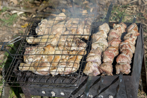 Grilled meat coals and logs
