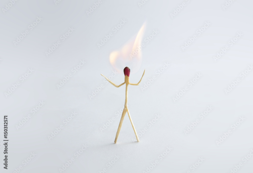 Concept of worried by stress, hotheaded, desperate, headache and annoying. A match burning and catching on fire.