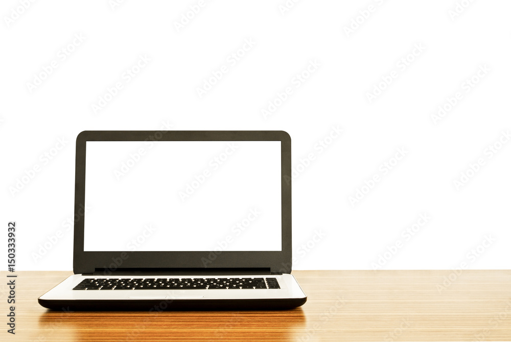 Laptop with blank screen on table Laptop with blank screen on table