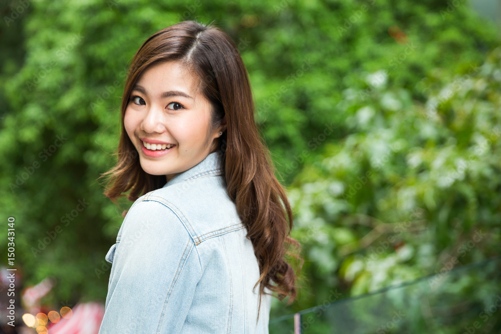 Young asian lady traveling in city center Young asian lady traveling in city center