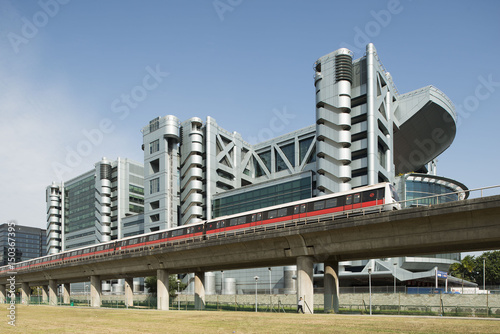 Photography An SMRT Train driving past the headquarters of Singpost.