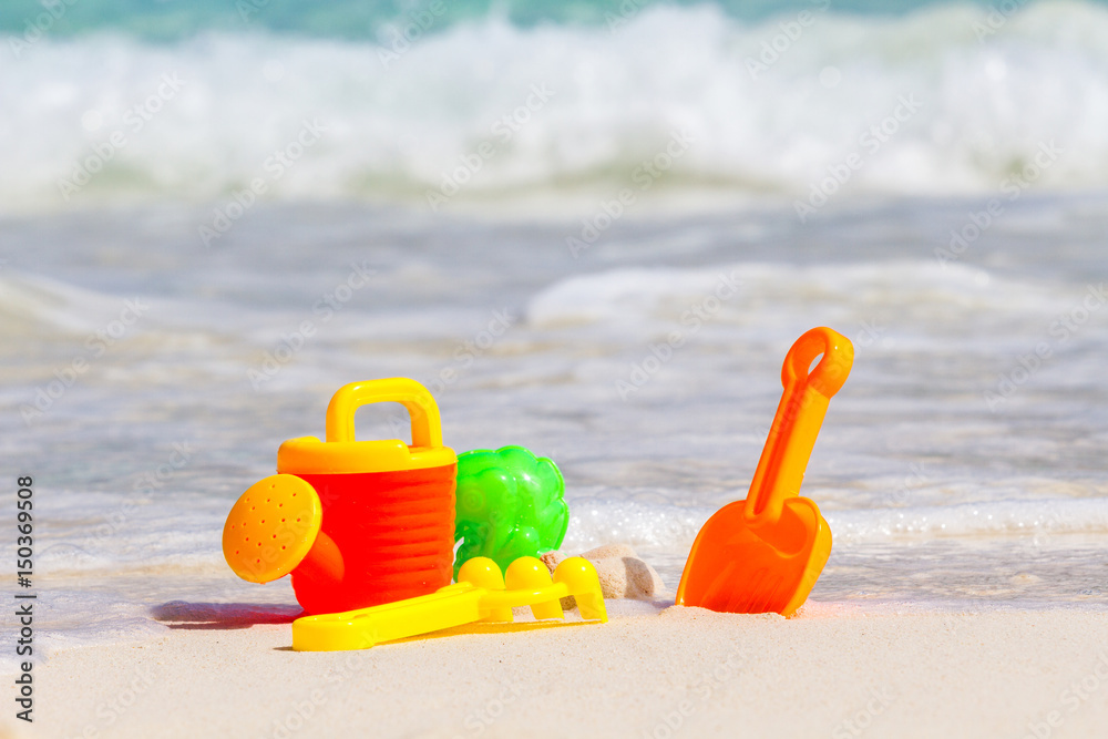 Toys for childrens sandboxes against the sea and the beach Toys for childrens sandboxes against the sea and the beach
