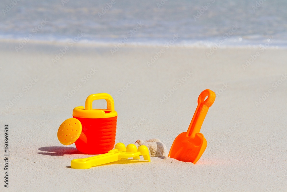 Toys for childrens sandboxes against the sea and the beach Toys for childrens sandboxes against the sea and the beach