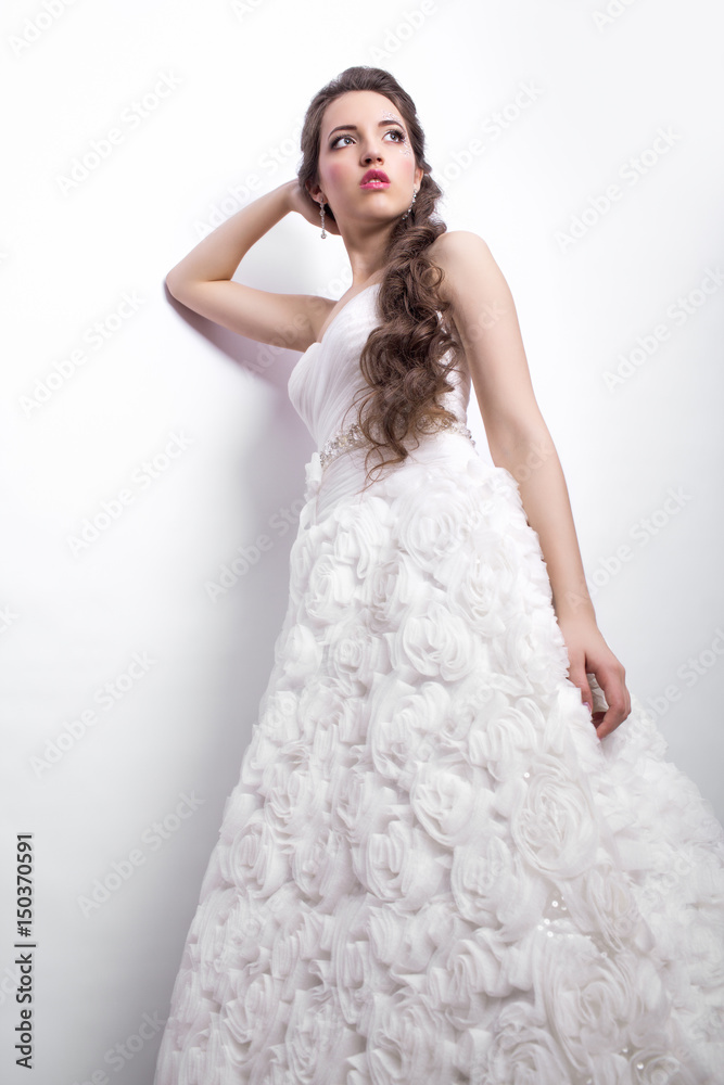 Portrait of beautiful young woman bride in white Wedding Dress Portrait of beautiful young woman bride in white Wedding Dress
