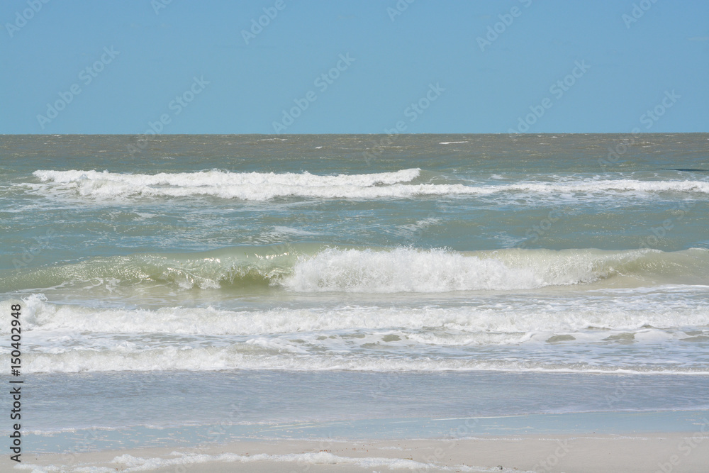 Surf is up on the Gulf of Mexico at Indian Rocks Beach Florida.