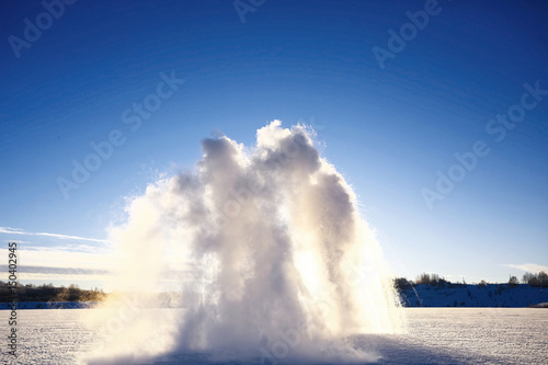 Snow geyser beating with great force