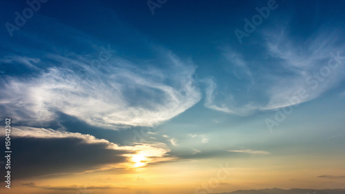 Colorful dramatic sky with cloud at Sunrise.Sky with sun background.
