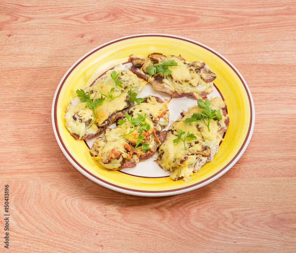 Pork chops baked with onion, mushrooms and cheese Pork chops baked with onion, mushrooms and cheese