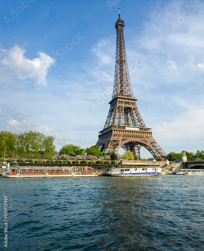 Eiffel Tower with river on the foreground in Paris