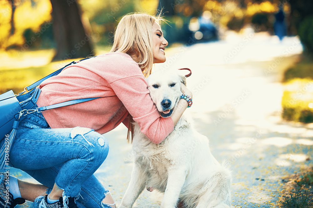 Woman enjoying park with dog Woman enjoying park with dog