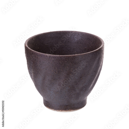 Black traditional tea cup of cast iron isolated on white background photo